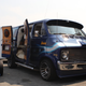 Illustration for article titled The Coolest Car At The Monterey Motorsports Reunion Is This Custom Van With an F1 Car